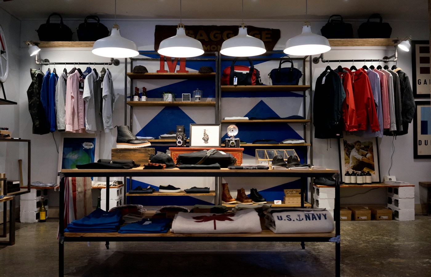 Stock arranged in a well-presented independent clothing shop